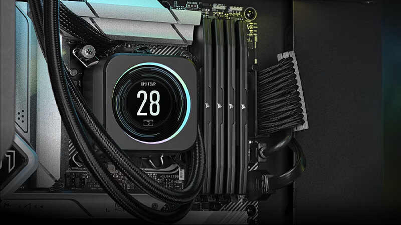 מודולי זיכרון Corsair Vengeance DDR5 מותקנים במחשב נייח לצד מערכת קירור המעבד